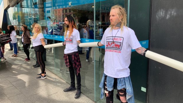 Protesters outside the Melbourne Aquarium on Monday. 