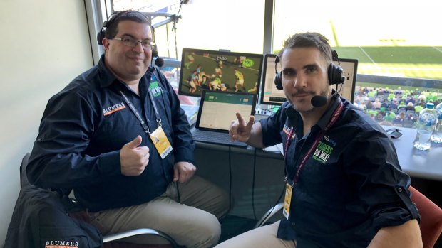 Risteski (right) and Chris Coleman in the commentator box at Canberra Stadium.