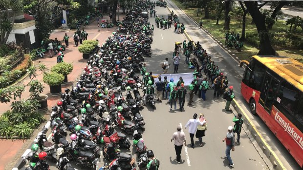 Drivers want the Indonesian government to guarantee better pay and conditions.