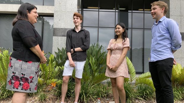 Three of the 30 Queensland students who achieved an ATAR rank of 99.95 - the best possible result. Declan Fletcher - Anglican Church Grammar School (far right), Katherine Nguyen - Mansfield State High School (middle right), Connor Davis - Wavell State High School (middle left) and Education Minister Grace Grace (far left).