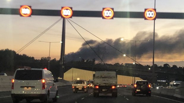 Plumes of smoke from a factory fire in Campbellfield on the approach to Melbourne early on Friday.