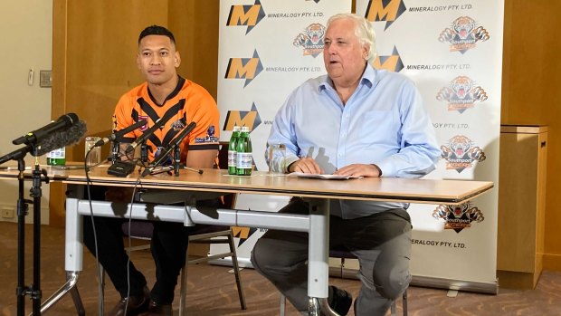 Israel Folau and Clive Palmer at their press conference at the Hilton Hotel in Brisbane on Friday.