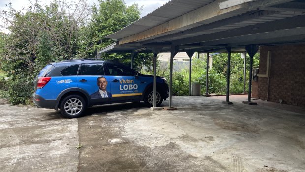 A campaign car for Vivian Lobo outside the Everton Park home he registered as his address.