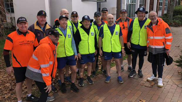 Royce Simmons and his crew after finishing day nine of his 300km charity walk from Gooloogong to Penrith.