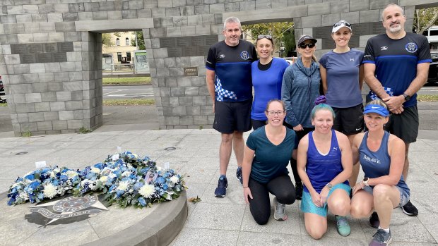 Tim Earl (top left) and Neil Sproat (top right) with their running group. Neil and Tim are cousins of Leading Senior Constable Lynette Taylor.