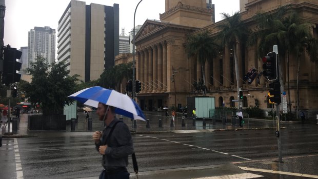 Brollies were the go in the Brisbane CBD for much of Thursday morning and early afternoon. (File image)
