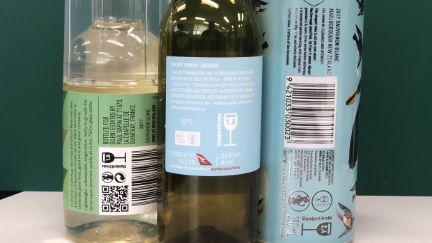 Public health advocates say alcohol producers are using label design to obscure the DrinkWise warning. 