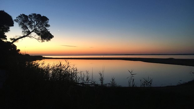 The small town of Loch Sport sits on the shore of the Gippsland Lakes. It has not been hit by fire, yet thousands of holidaymakers have returned to Melbourne.