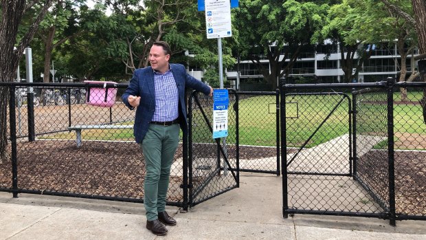 Lord mayor Adrian Schrinner swings the gates open at New Farm off-leash park.
