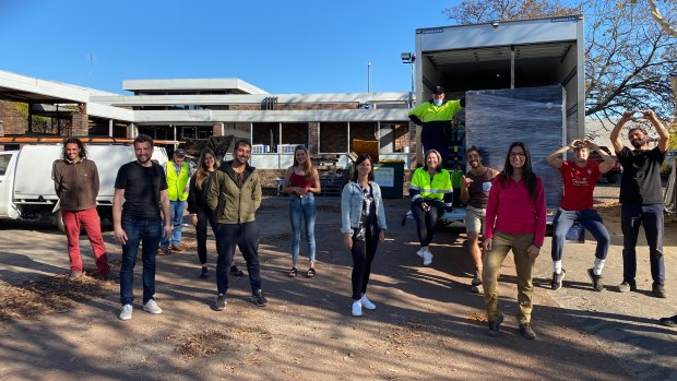 Relieved backpackers in Manjimup after receiving food donations from Second Bite.