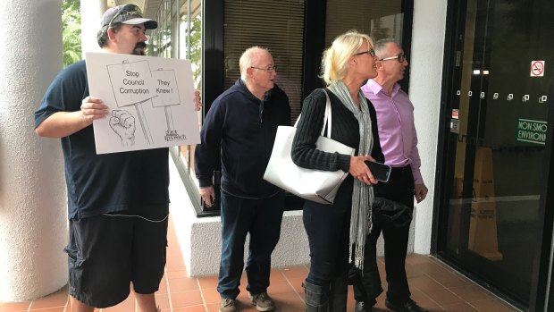 Ipswich Residents and Ratepayers Association members chanting outside the Ipswich City Council Administration Building on Wednesday.