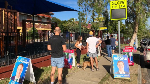 A queue forms at Morningside State School before the voting station is even open.