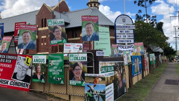 No line-up to vote at Vulture Street, East Brisbane, but a clear message from the polling booth host.