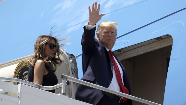 President Donald Trump and Melania Trump board Air Force One after meeting survivors of the gun massacre in Dayton, Ohio. 