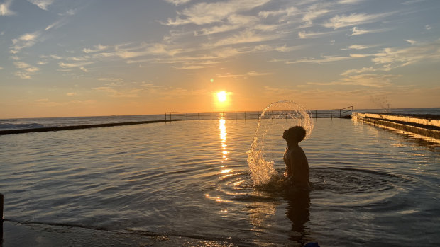 Sam, an early swimmer at Austinmer beach in Wollongong. Photo taken at sunrise with the new Apple iPhone Xs Max.