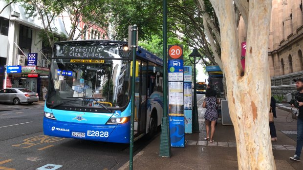 A mask-wearing bus driver in the Brisbane CBD today.