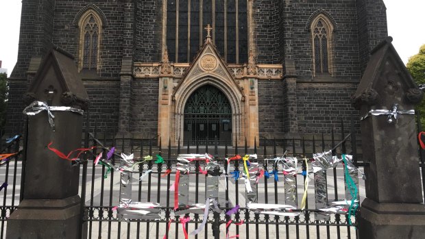 Ribbons tied to the gates of St Patrick's Cathedral on Tuesday night. 