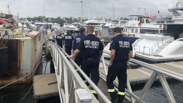 Hazmat crews arrive at the All Occasion Cruises moorings to conduct testing earlier this year.