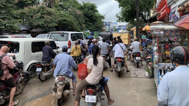 A traffic jam outside the main market place in down town Sihanoukville. It can take hours to drive just a few kilometres.