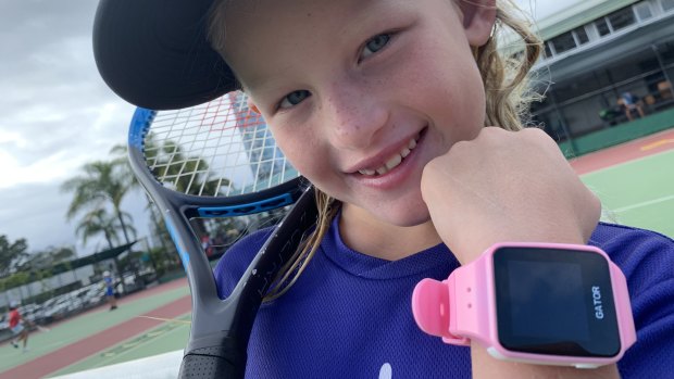 Security researcher Troy Hunt's six-year old daughter Elle with a TicTocTrack smartwatch.