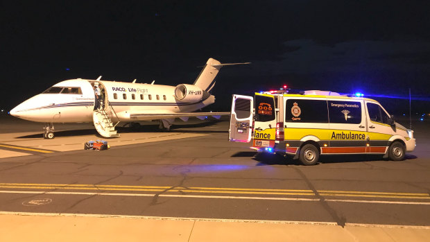 The men are transported by RACQ Lifeflight Rescue Air Ambulance jets from Moranbah airport after the mine explosion on Wednesday. 