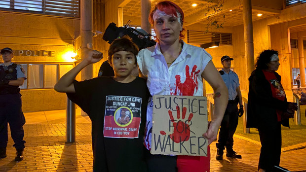 Activist Elizabeth Jarrett (right) at the protests in Sydney's CBD.