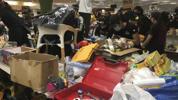 Inside Polytechnic University supplies are piled on tables like a protester supermarket.