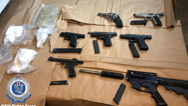 Firearms and drugs seized by police during raids at Botany and Rockdale in August. 