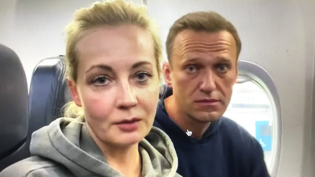 Alexei Navalny and his wife, Yulia, on board their flight to Moscow, before he was detained.