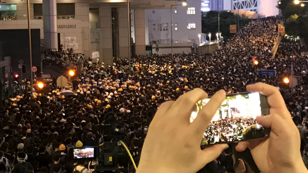 Protesters outside the Hong Kong Police headquarters on Friday.