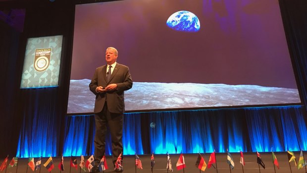 Al Gore presented an updated package highlighting heat-stressed cities and graphs which he said showed investment 
 shifts from fossil fuels to wind and solar energy in a range of countries.