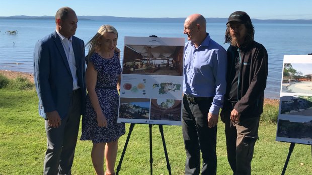 (From left) Cameron Costello, Tourism Minister Kate Jones, Redlands councillor Peter Mitchell and Josh Walker with the plans for QUAMPI.
