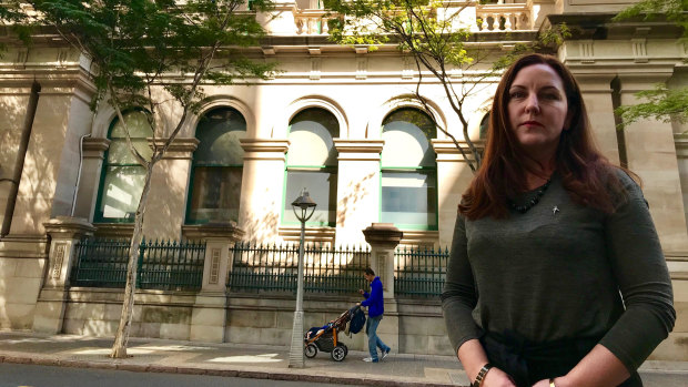National Trust of Australia Queensland heritage manager Jane Alexander questions why a new entrance is needed on Creek Street to the heritage-listed NAB building on Creek and Queen streets.