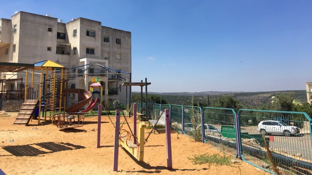 A segregated children's playground in the settlement of Emmanuel.
