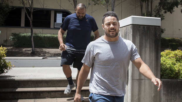 NRL star Jarryd Hayne reports at Castle Hill Police Station accompanied by friend Ray Roumanous. 