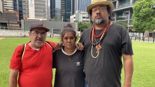 Adrian Ware’s uncle Kargun Fogarty (right), with Adrian’s mother Lillian Butterworth Yock (middle) and supporter Wookku Fogarty (centre) outside the Brisbane Supreme Court on Thursday.