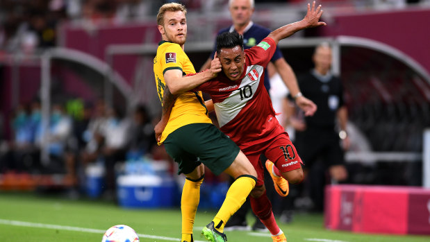 Nathaniel Atkinson in action in the Socceroos’ World Cup qualifying play-off game against Peru.