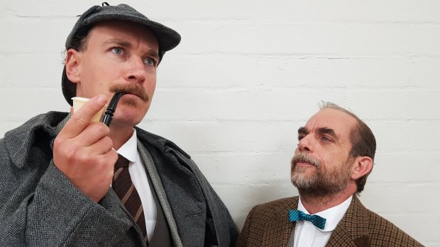 Philip Meddows as Sherlock Holmes and  Peter Fock as Dr Watson in Tempo Theatre's production of <i>The Hound of the Baskervilles</i>. 