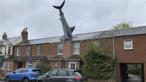 Bill Heine's home - with the shark crashing through the roof.