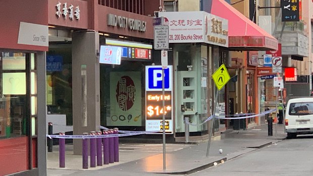 Police taped off sections of the footpath on Little Bourke Street.