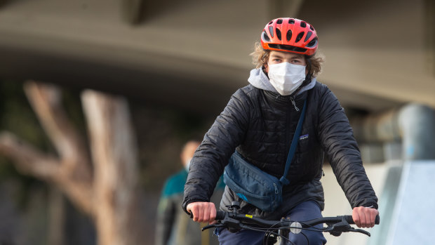 Cyclist Lachlan Goller says he's happy to wear a mask while riding in order to reduce the COVID-19 spread.