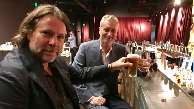 John Collins and Scott Hutchinson toast to Friday's night at the Fortitude.