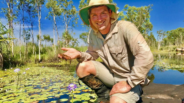 Curtin researcher Adam Cross holding a sample of the rare carnivorous plant in the Kimberley.