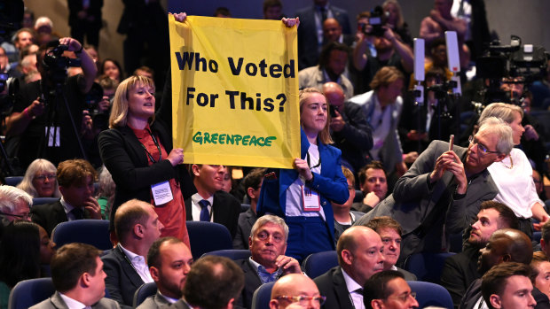 Greenpeace protesters disrupt British Prime Minister’s Liz Truss keynote speech at the conservative party’s conference.