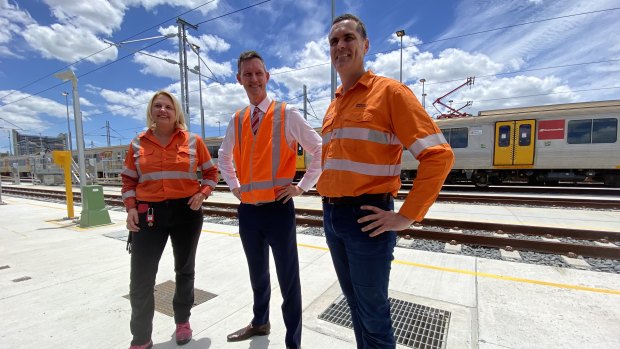 Queensland Rail chief executive Kat Stapleton, Transport Minister Mark Bailey and Cross River Rail project director Jeremy Kruger inspect the expanded Mayne train holding yards.