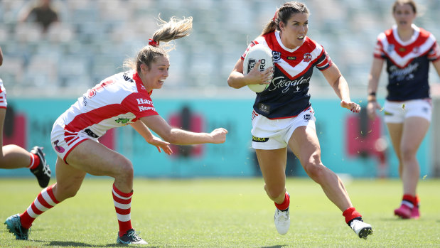 Roosters cross-code star Charlotte Caslick leaves Kezie Apps clutching at air.