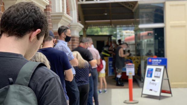 Queues at a pop-up vaccination clinic at Roma Street station in Brisbane last week.