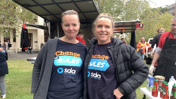 Waitresses Amy, 36, and Virginia, 42, outside Trades Hall before the Change the Rules rally in Melbourne's CBD. 