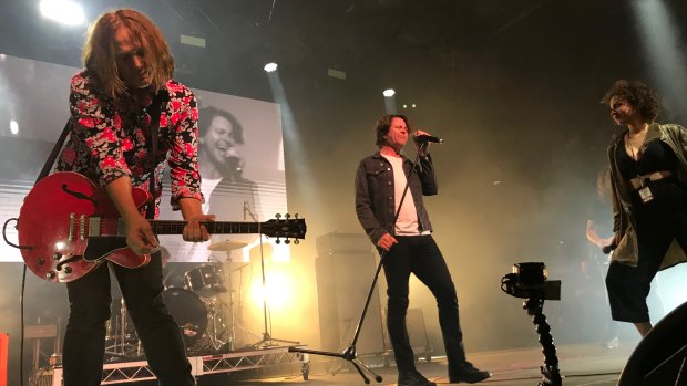 Powderfinger's Ian Haug and Bernard Fanning (centre) with Sahara Beck 