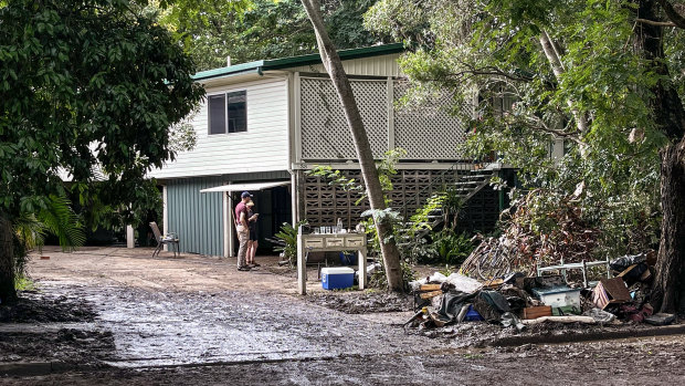 The first day’s aftermath and cleanup efforts along Ithaca and Enoggera creeks in Brisbane’s inner north-west.